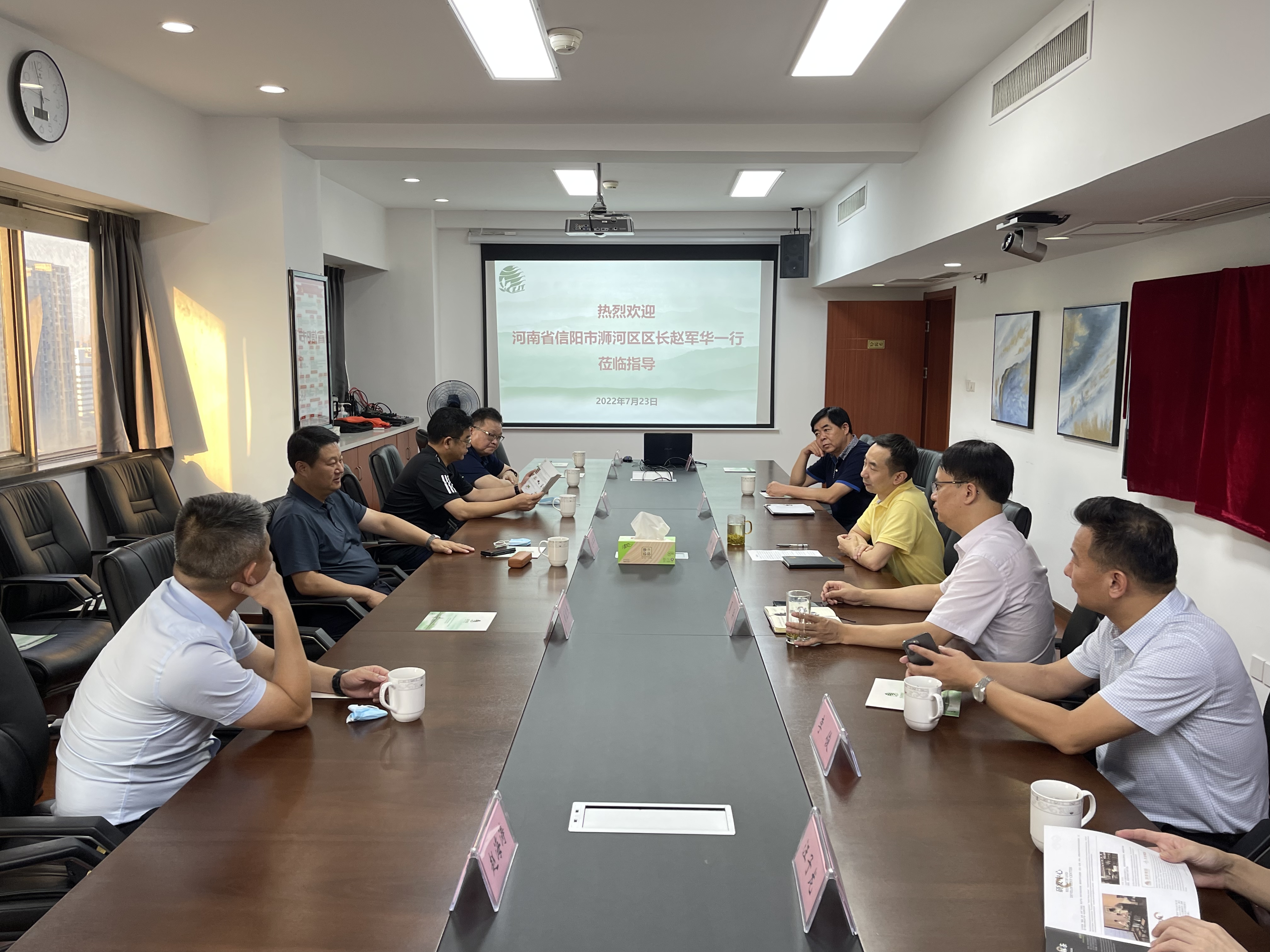 河南省信阳市浉河区区长赵军华一行莅临开云体云APP官网入口考察交流